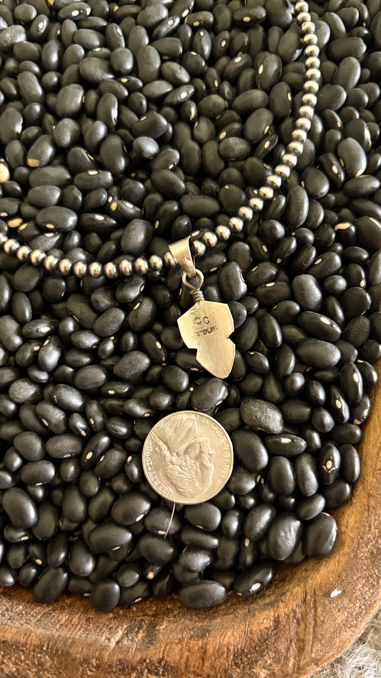 SMALL FEATHER PENDANT