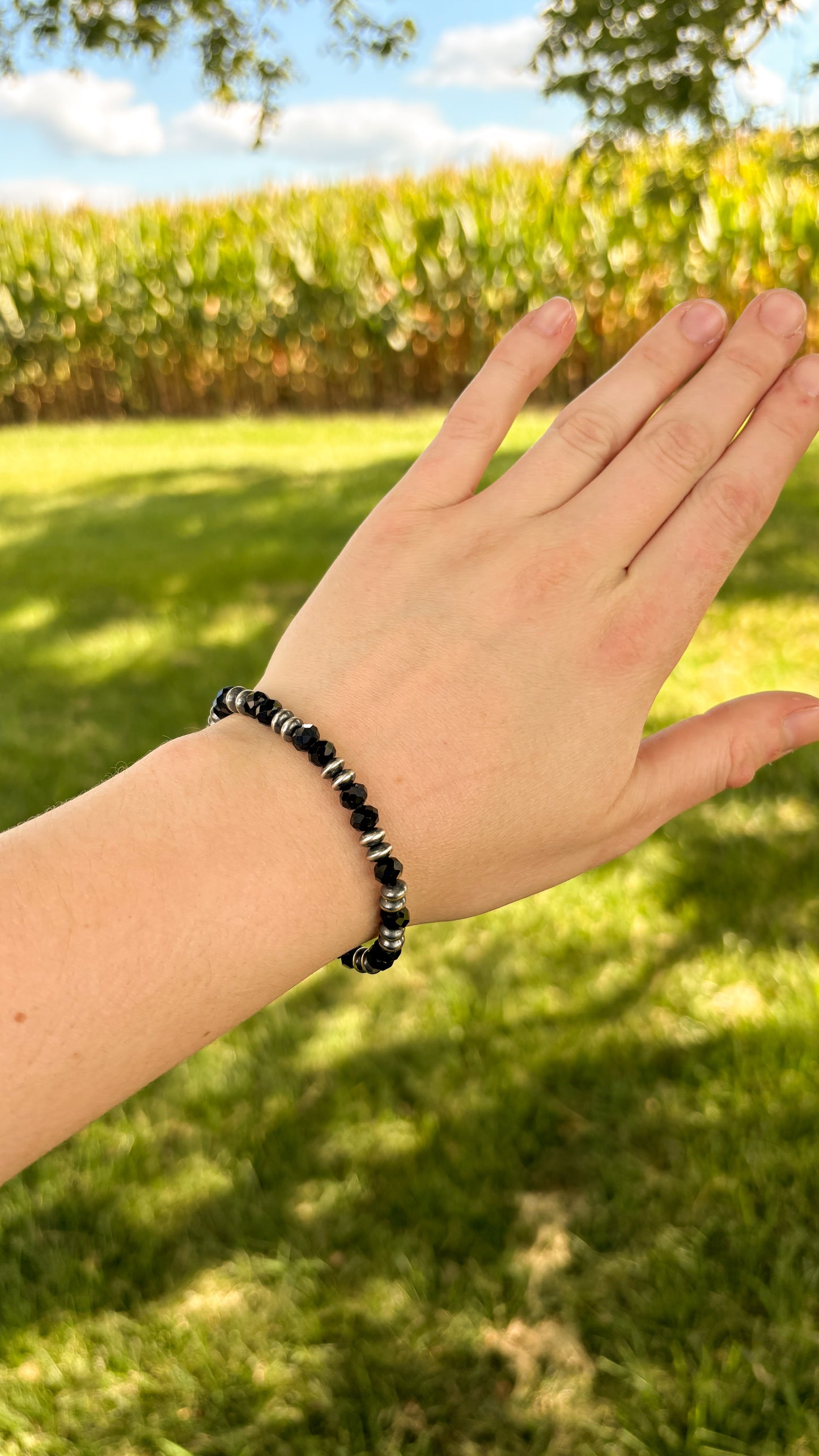 BLACK ONYX SAUCER PEARL STRETCH BRACELET