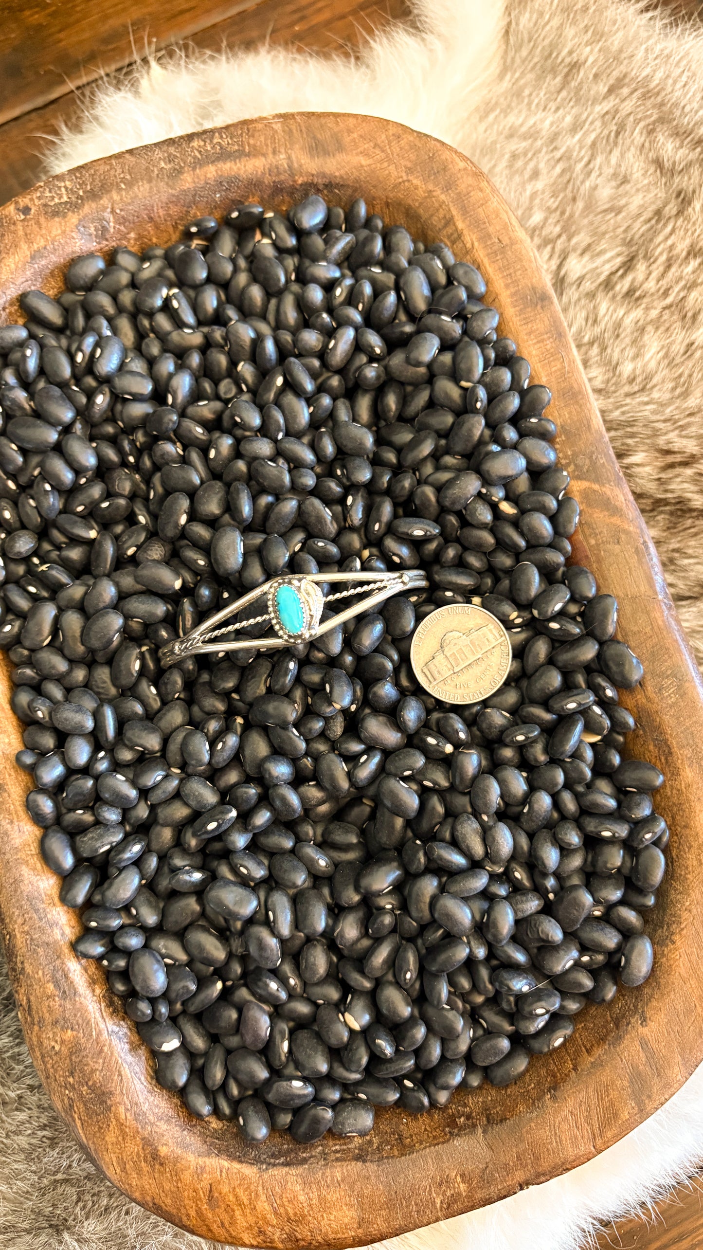 OVAL STONE TURQUOISE CUFF W FEATHER DETAIL