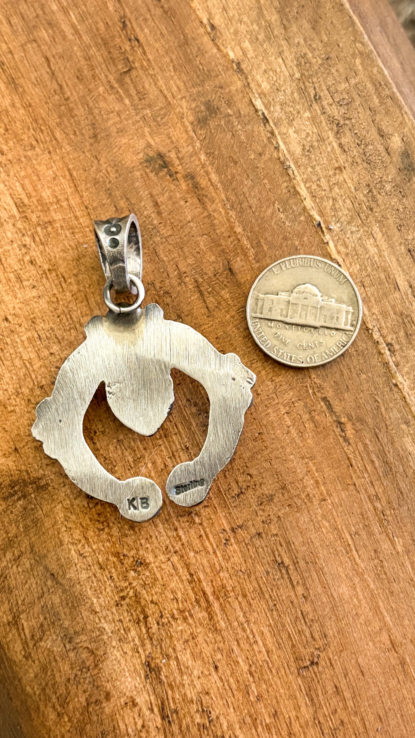 PINK CONCH NAJA PENDANT BY KEVIN BILLAH
