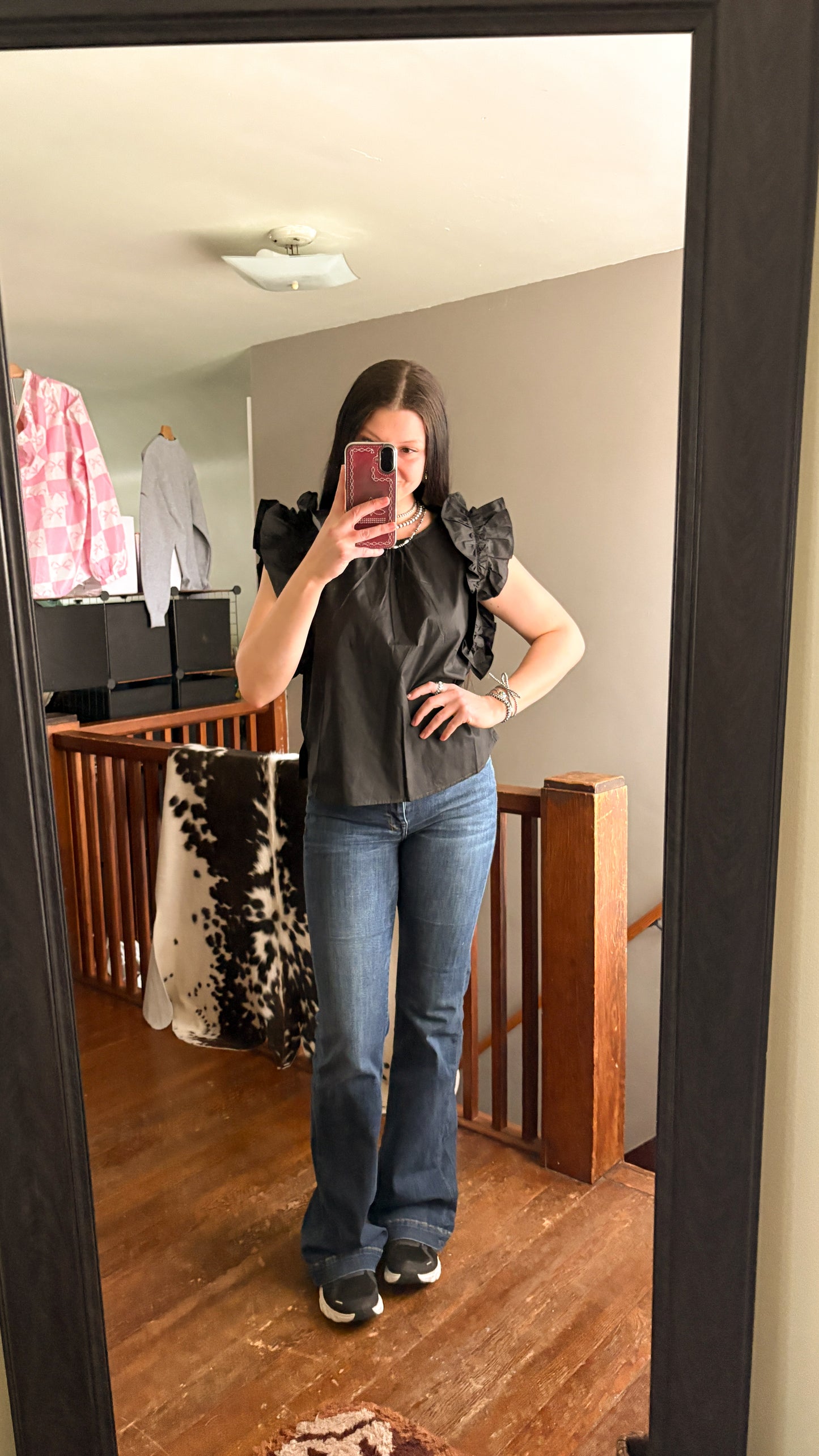 BLACK SLEEVELESS RUFFLE TOP