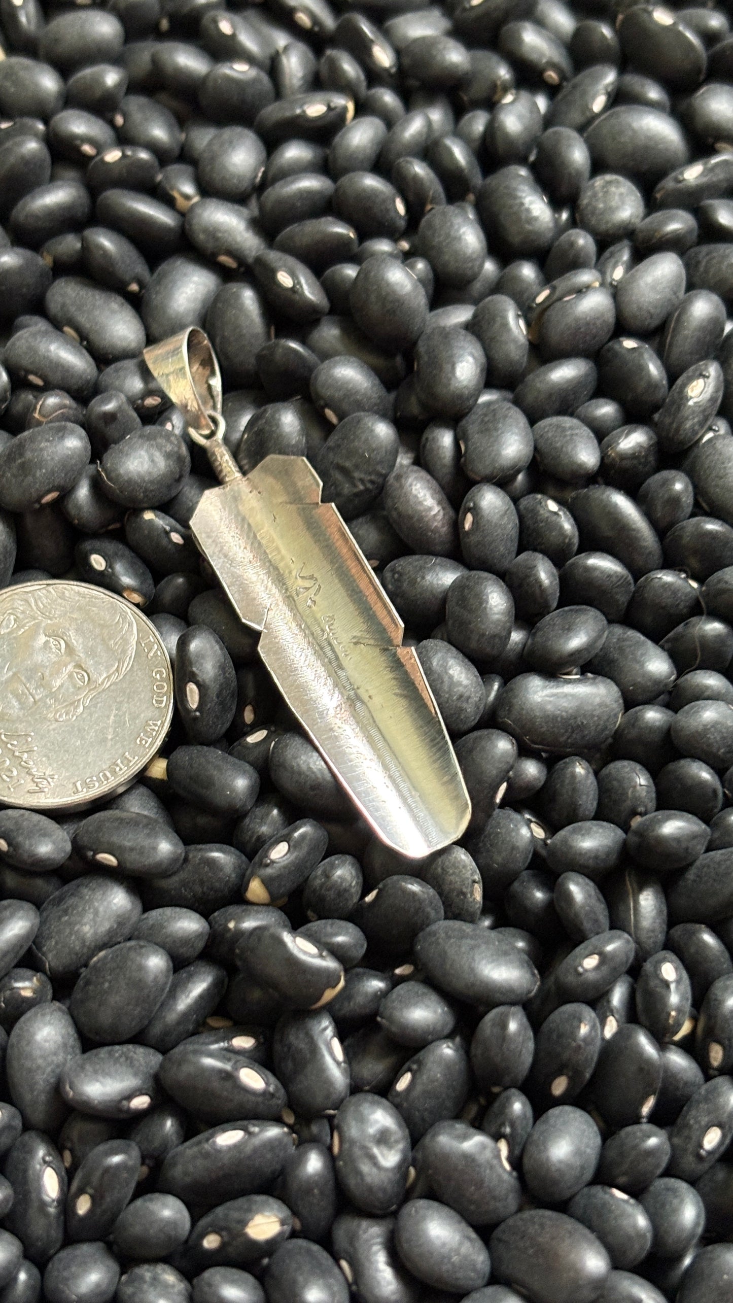 KINGMAN TURQUOISE FEATHER PENDANT BY CHESTER CHARLEY