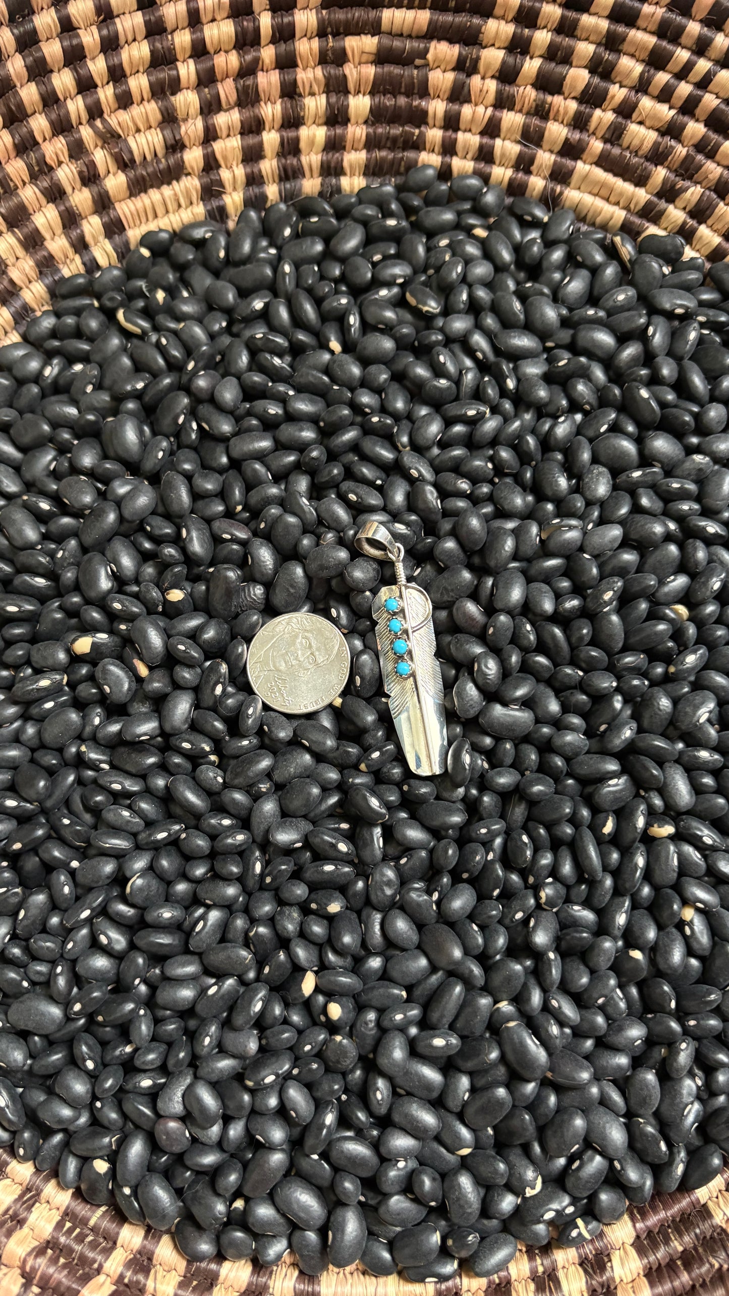 KINGMAN TURQUOISE FEATHER PENDANT BY CHESTER CHARLEY