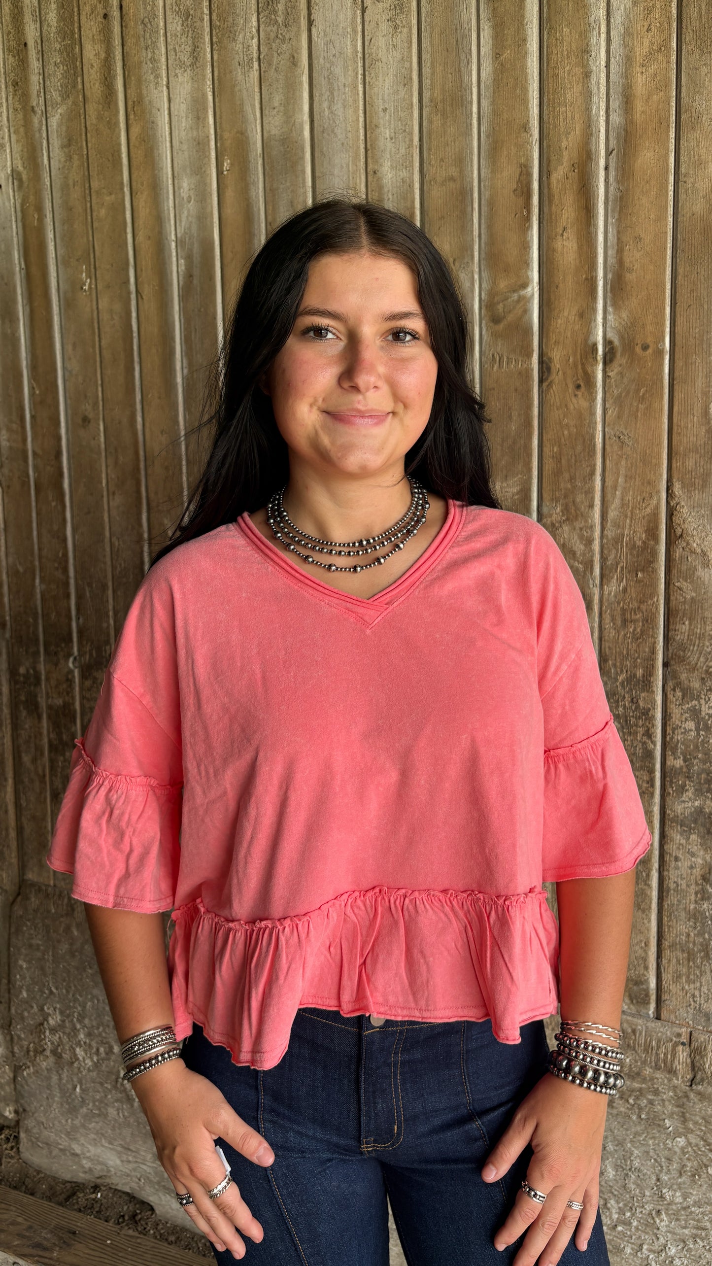 CORAL V NECK RUFFLE TOP