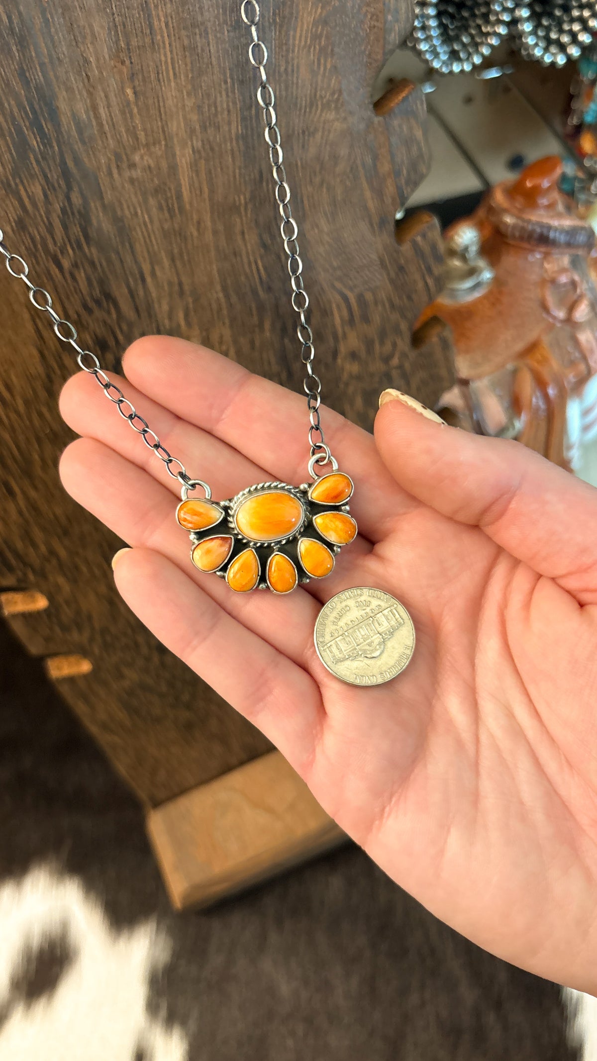 ORANGE SPINY HALF CLUSTER NECKLACE BY MARCELLA JAMES