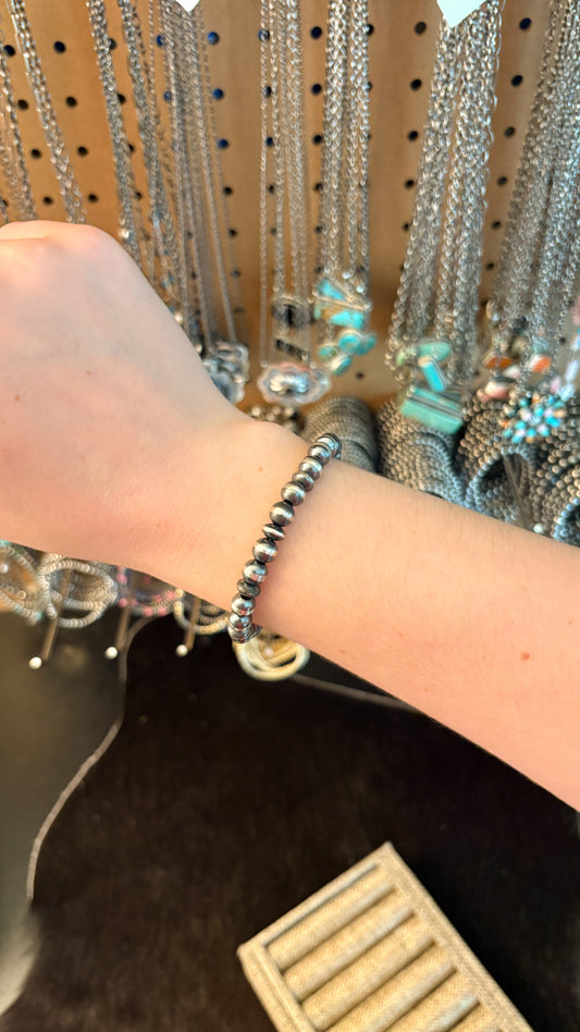 7MM STERLING SILVER PEARL & SAUCER STRETCH BRACELET