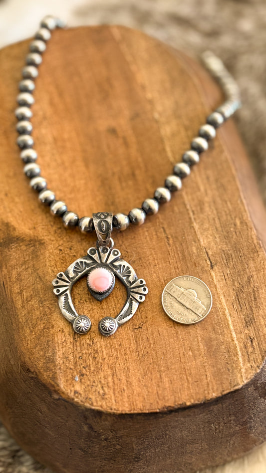 PINK CONCH NAJA PENDANT BY KEVIN BILLAH