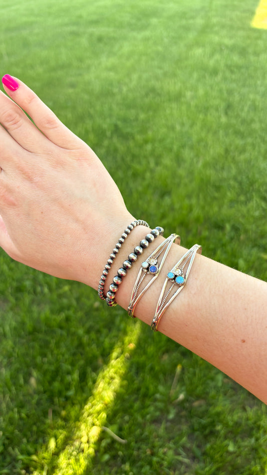 DOUBLE STONE OPAL CUFF WITH FLOWER DETAILING