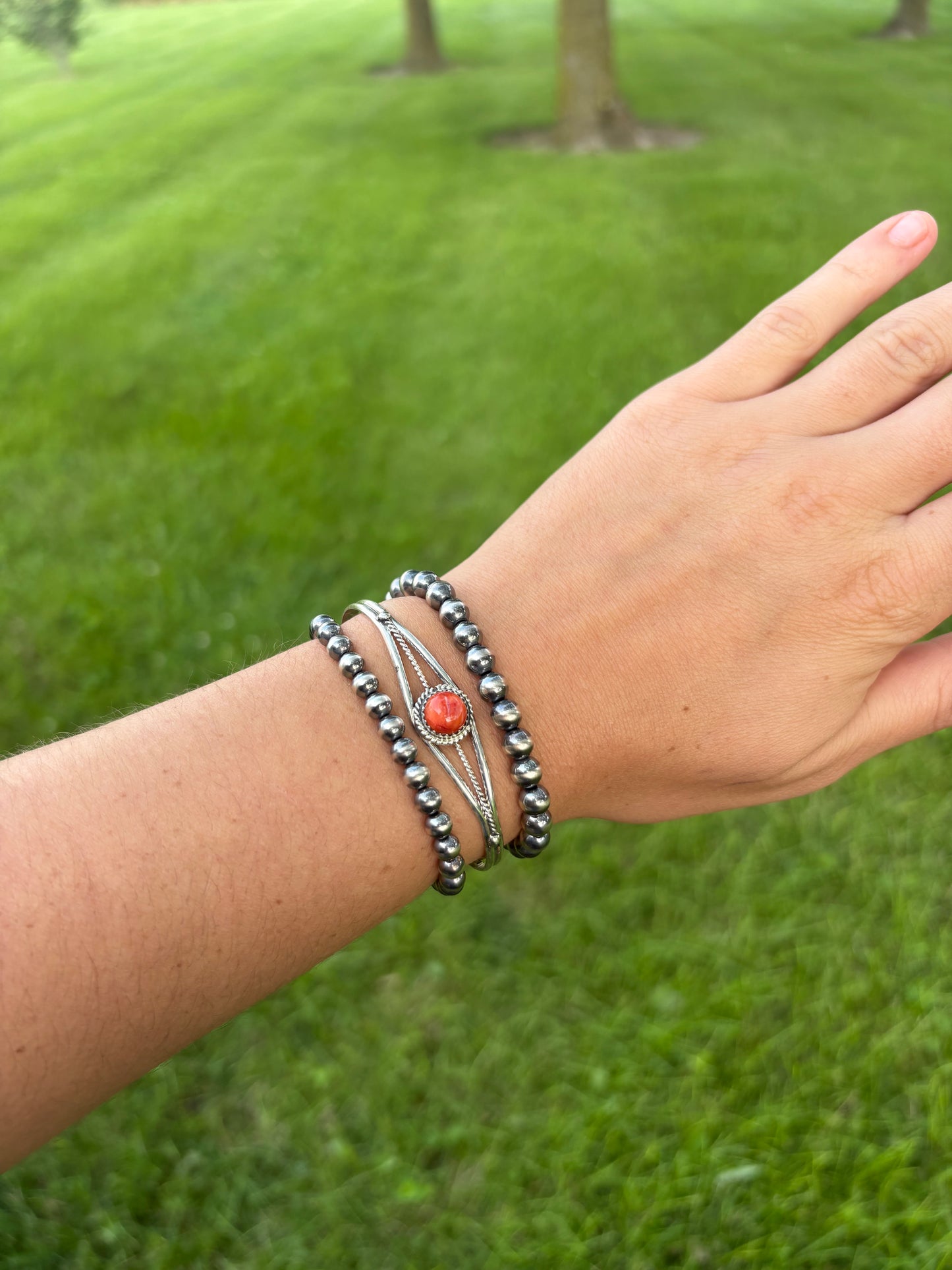 RED SPINY CUFF BY ESTHER WHITE