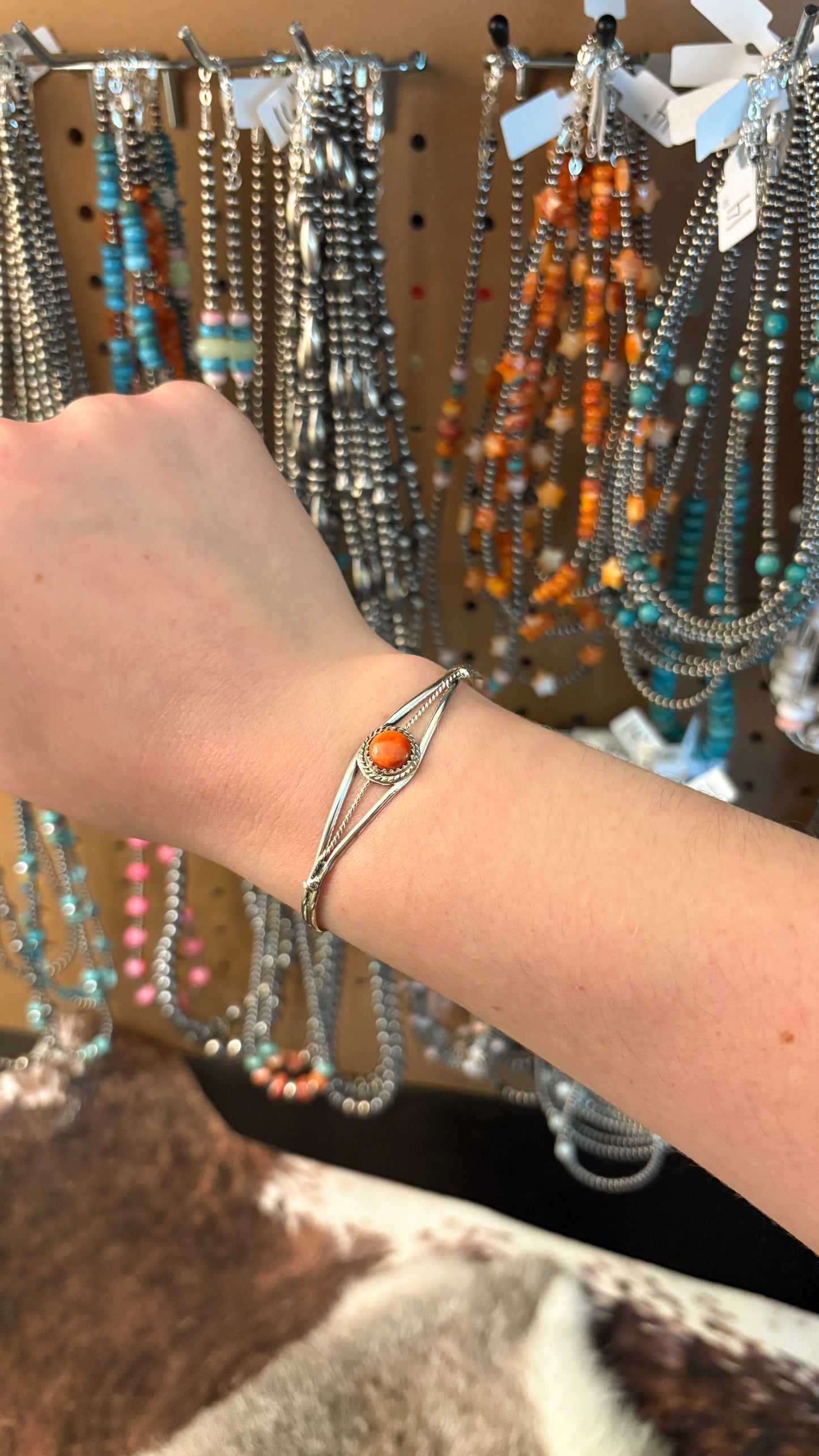 SINGLE STONE RED SPINY OYSTER CUFF BY ESTHER WHITE