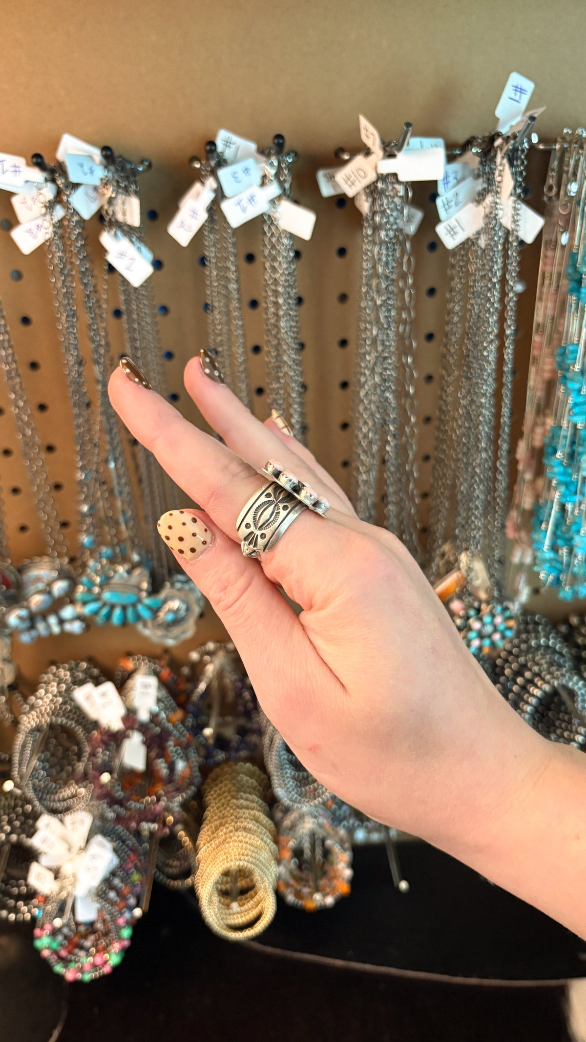 PINK CONCH STARSHOT CLUSTER RING W STAMPED CIGAR BAND