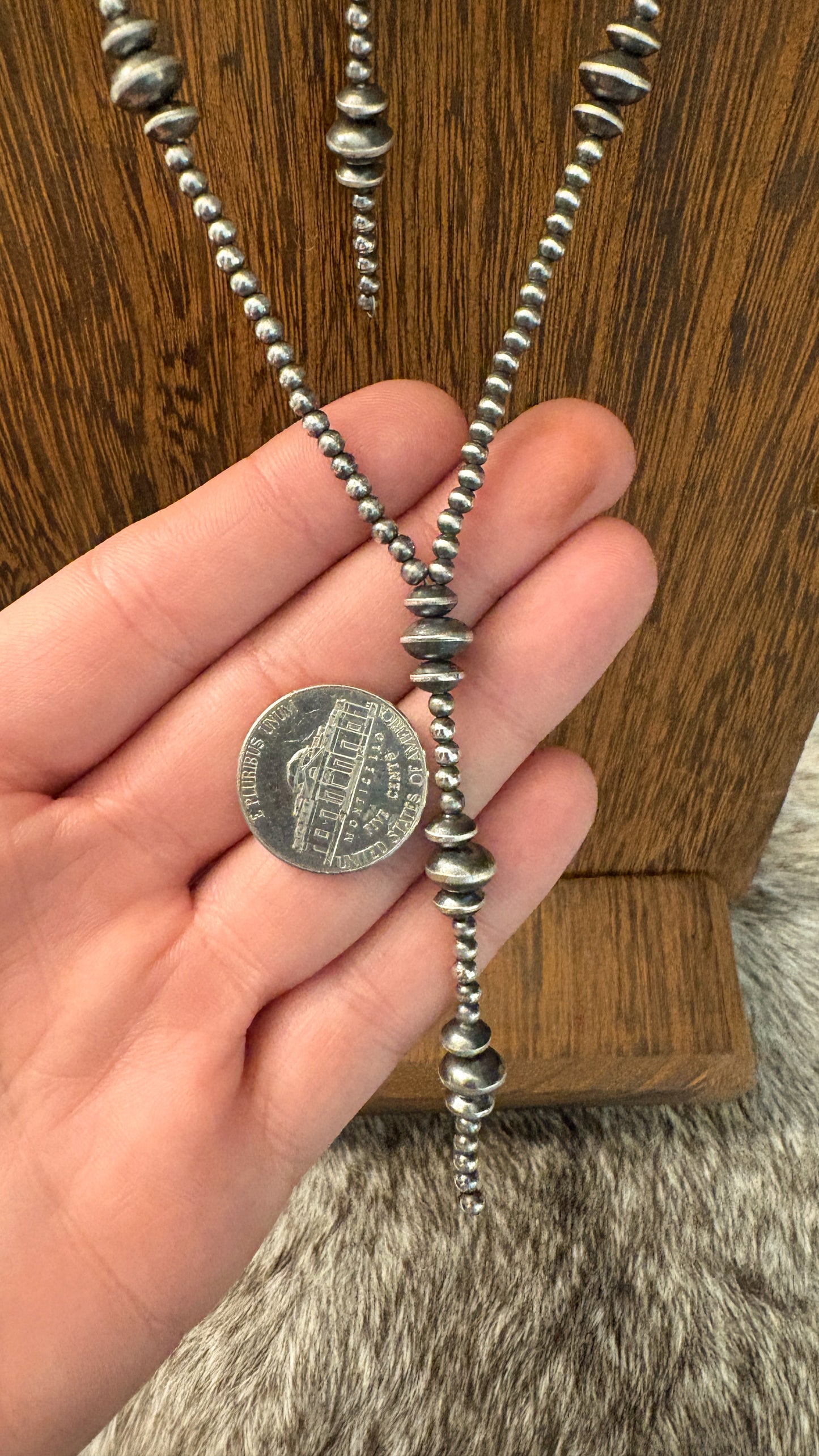 STERLING SILVER SAUCER PEARL LARIAT