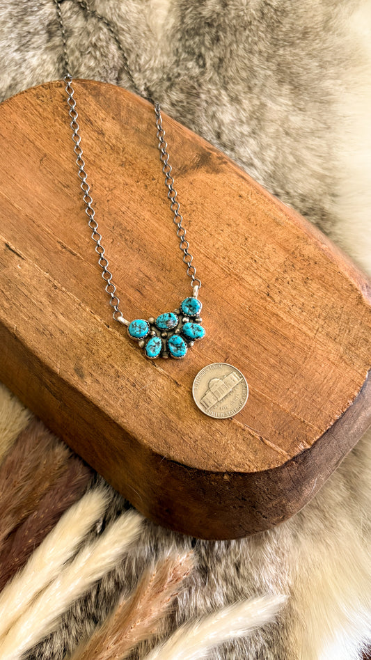 HALF CLUSTER NECKLACE BY DONOVAN NEZ