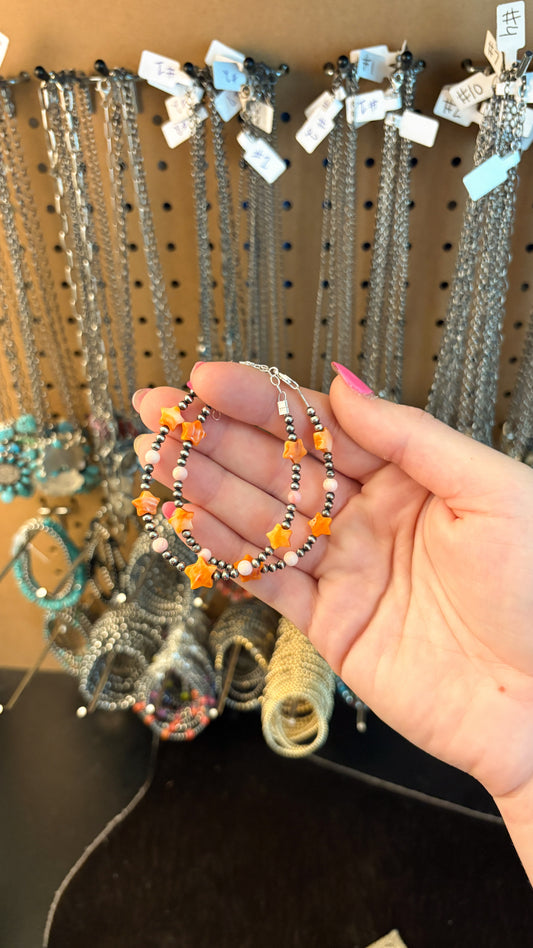 ORANGE SPINY STAR & PINK CONCH BRACELET