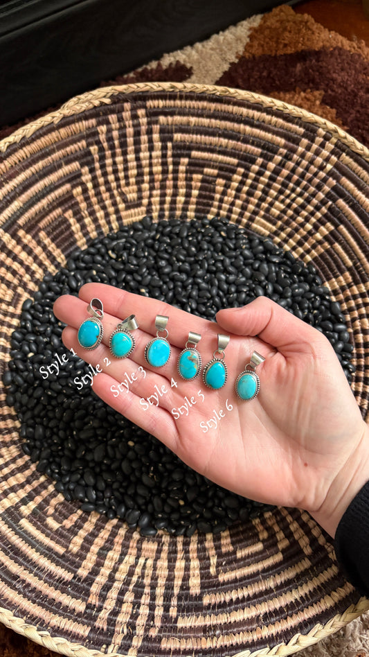 TURQUOISE PENDANT W DECORATIVE BEZEL