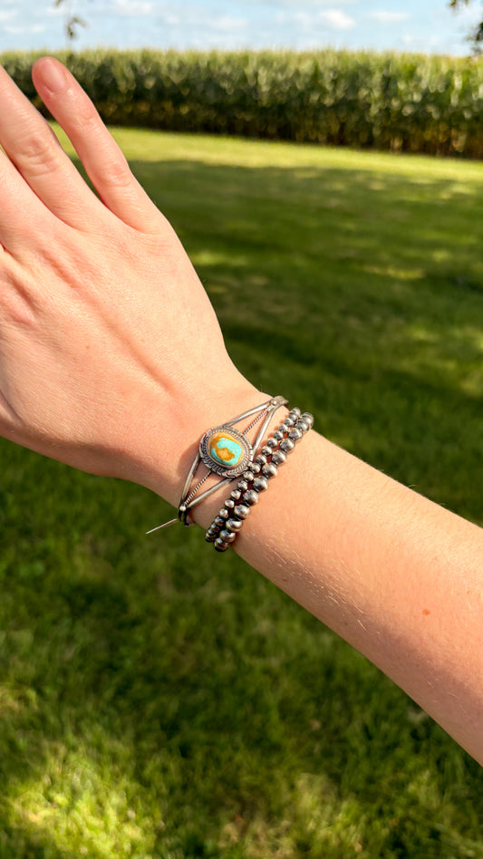 TURQUOISE CUFF WITH ROPE DETAIL