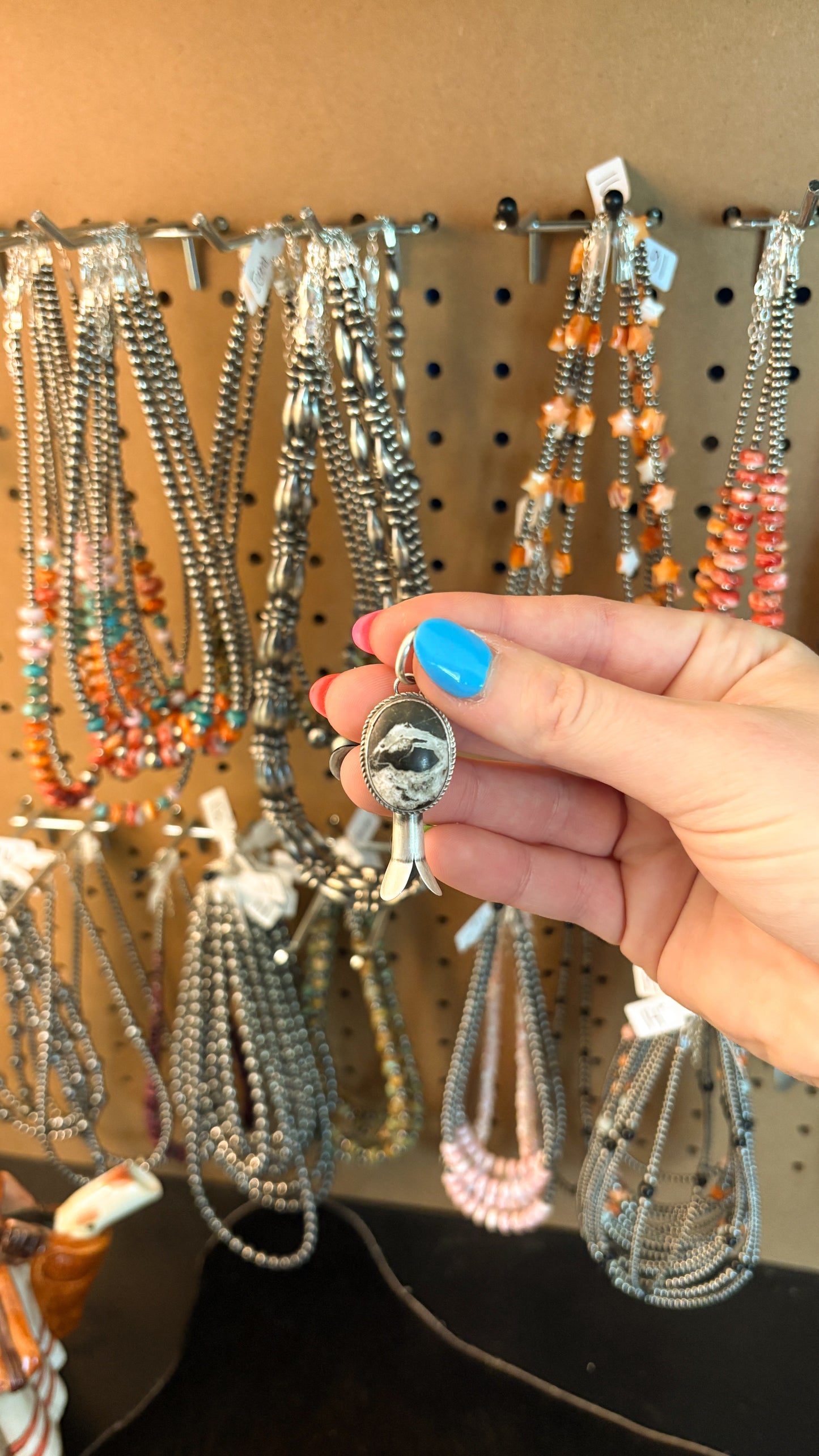 WHITE BUFFALO BLOSSOM PENDANT