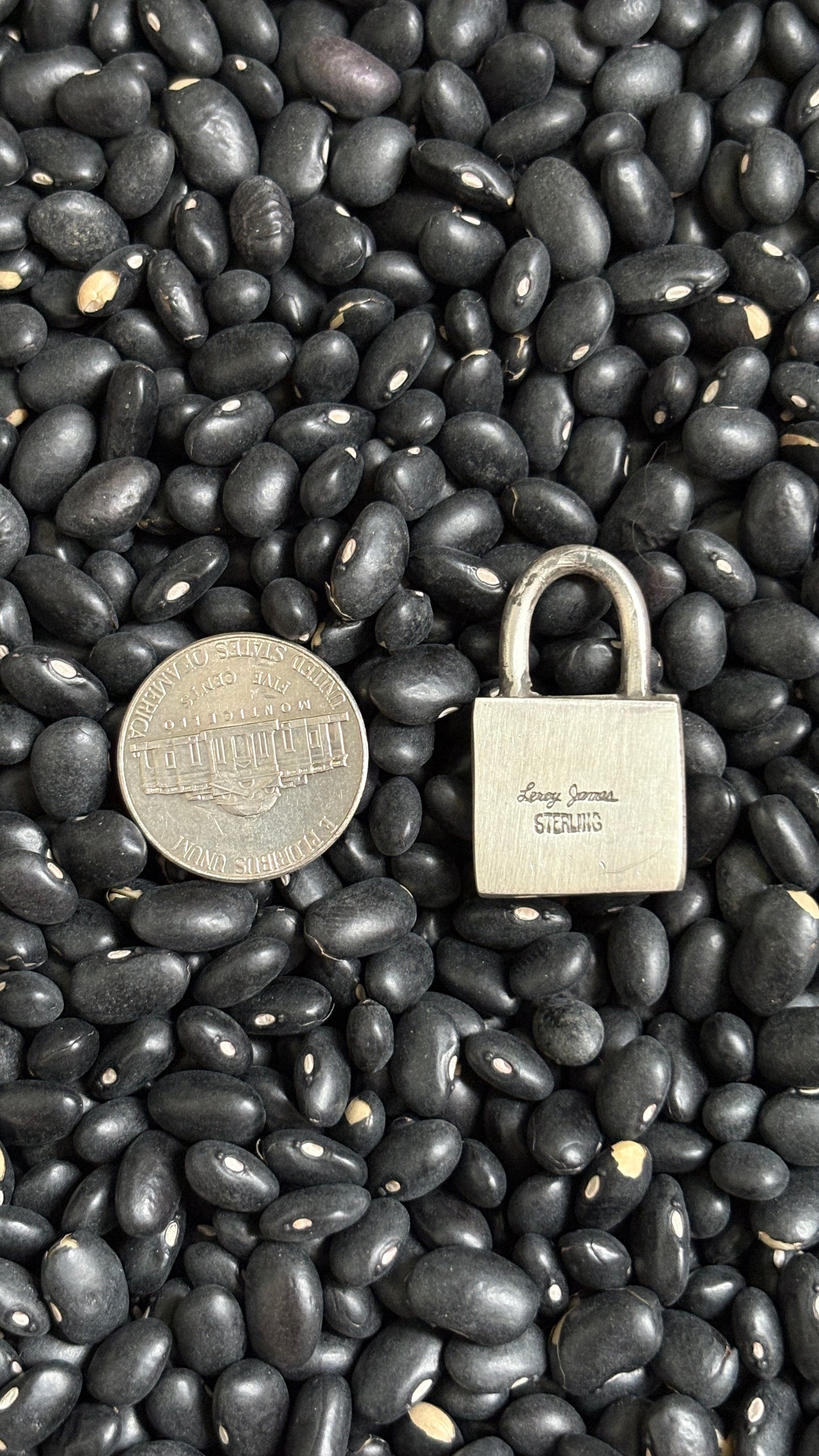 PINK CONCH LOCKET PENDANT BY LEROY JAMES