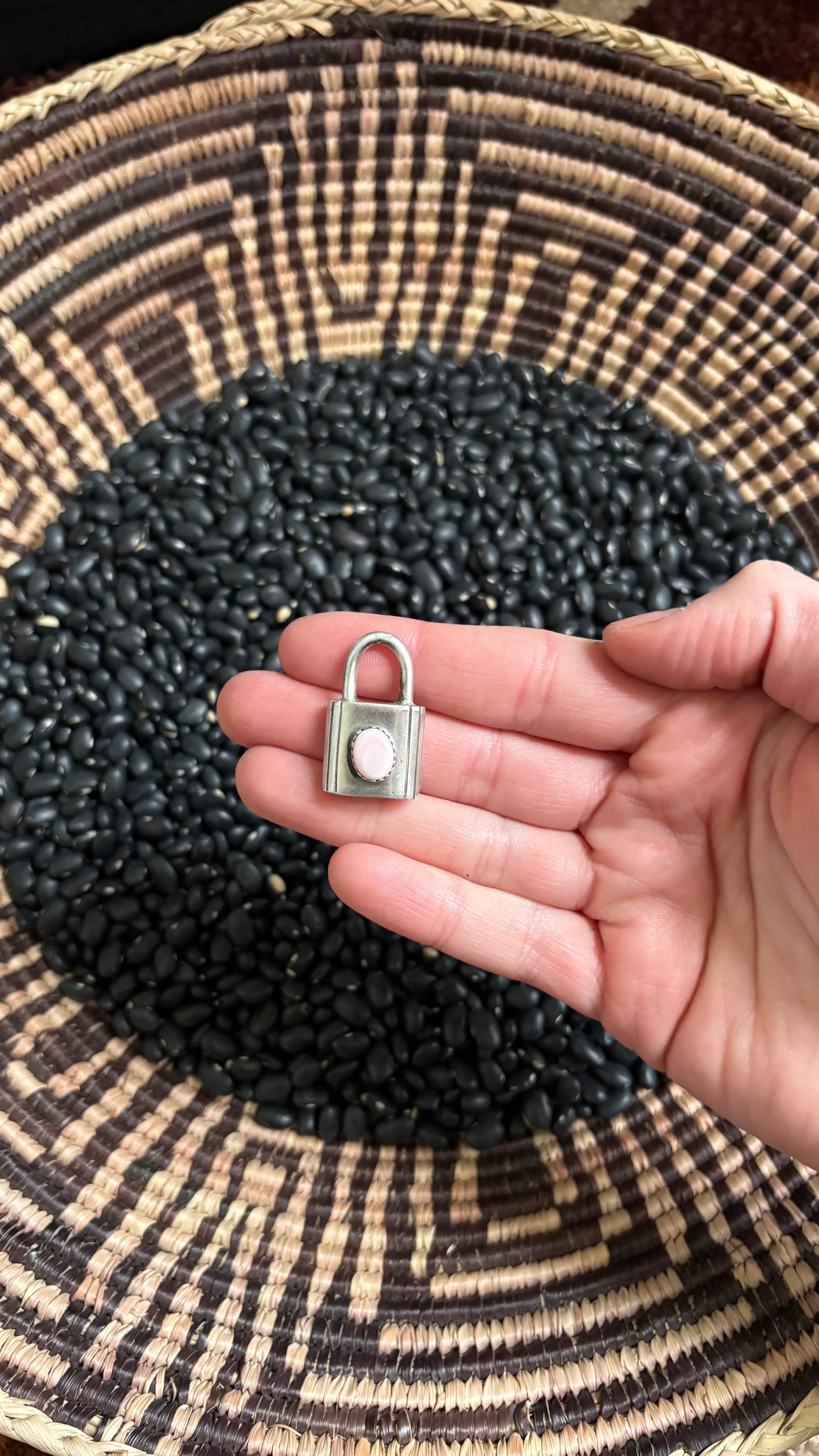 PINK CONCH LOCKET PENDANT BY LEROY JAMES