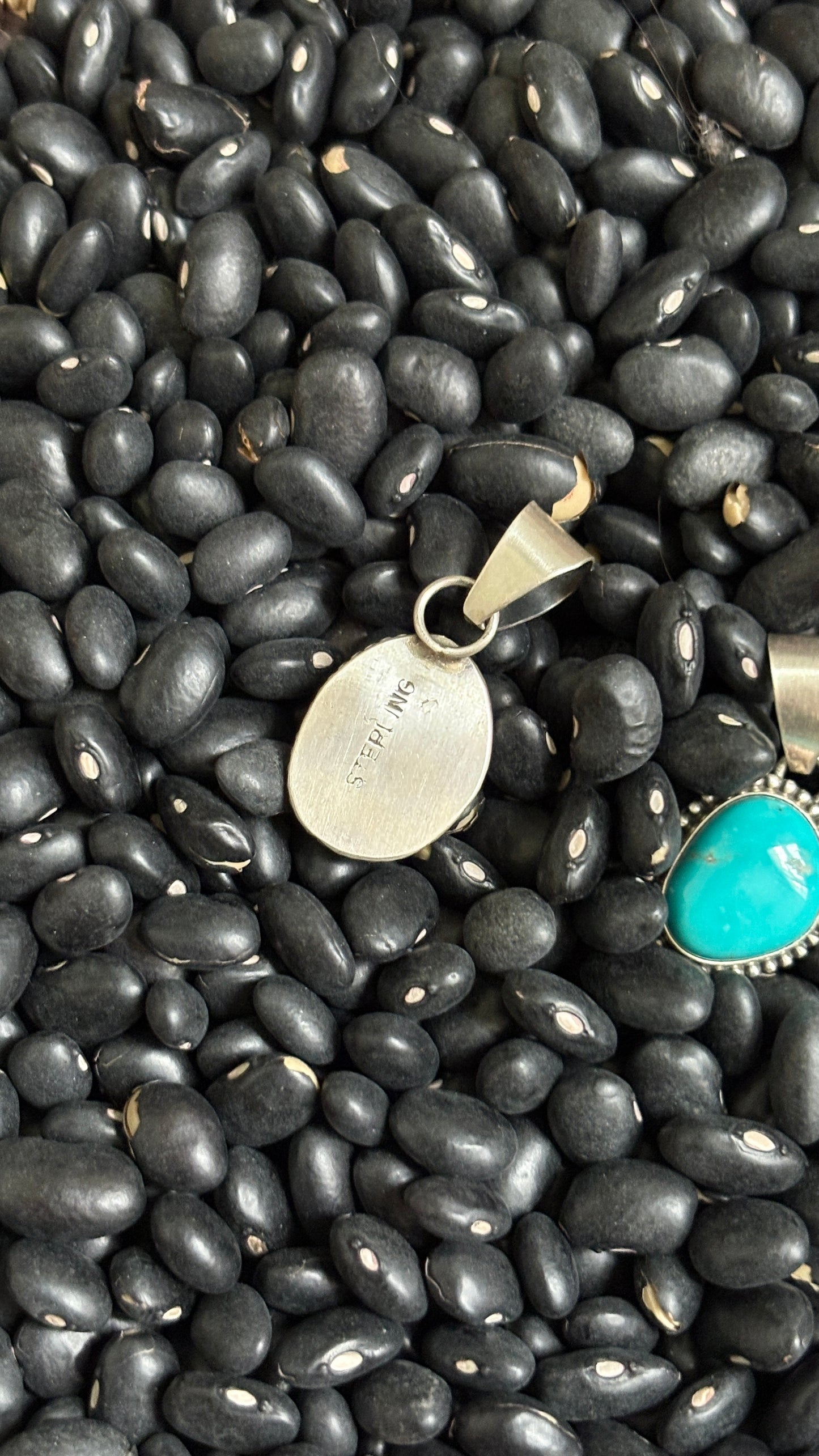 TURQUOISE PENDANT W DECORATIVE BEZEL