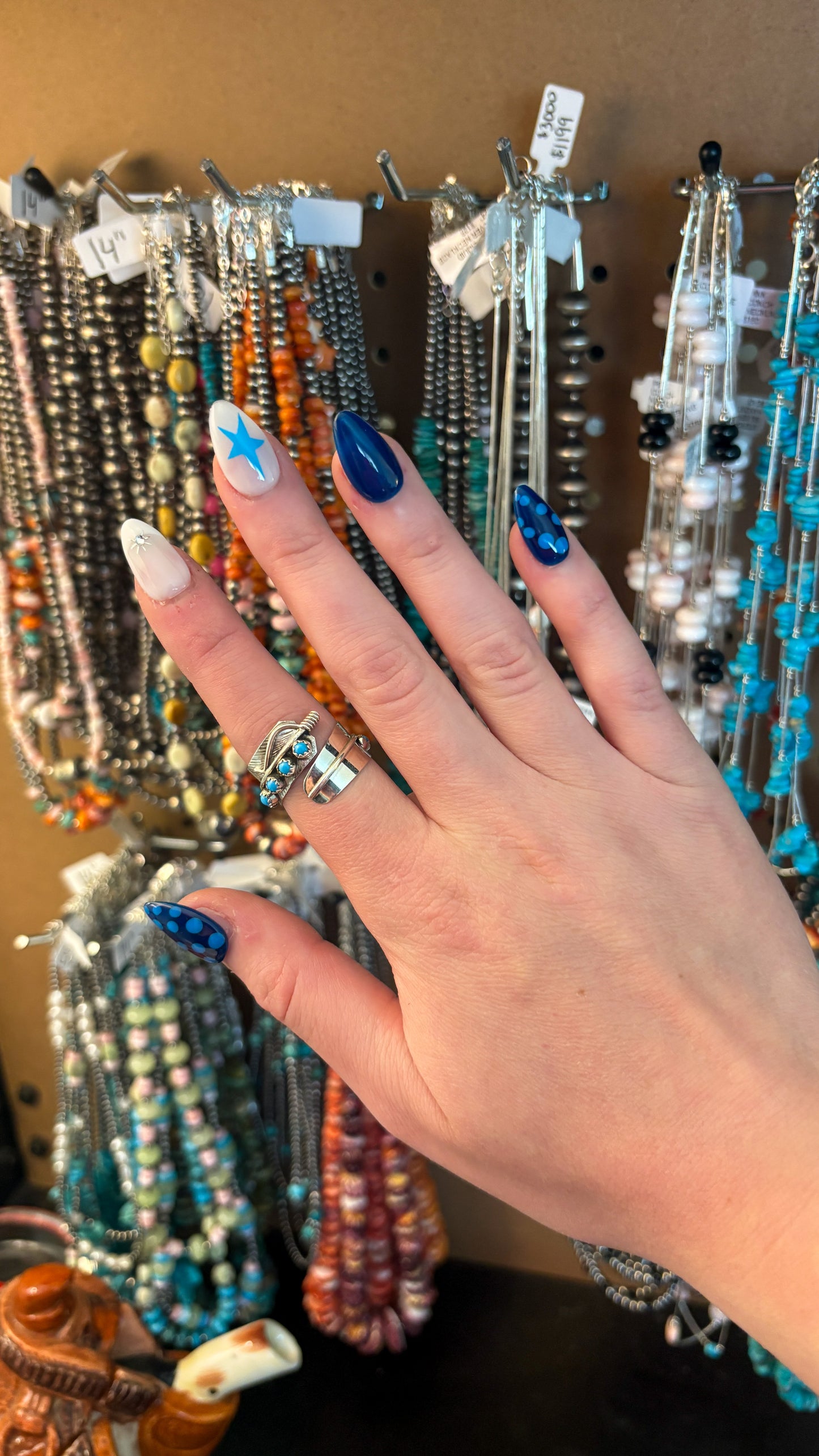 TURQUOISE ADJUSTABLE FEATHER RING BY CHESTER CHARLEY