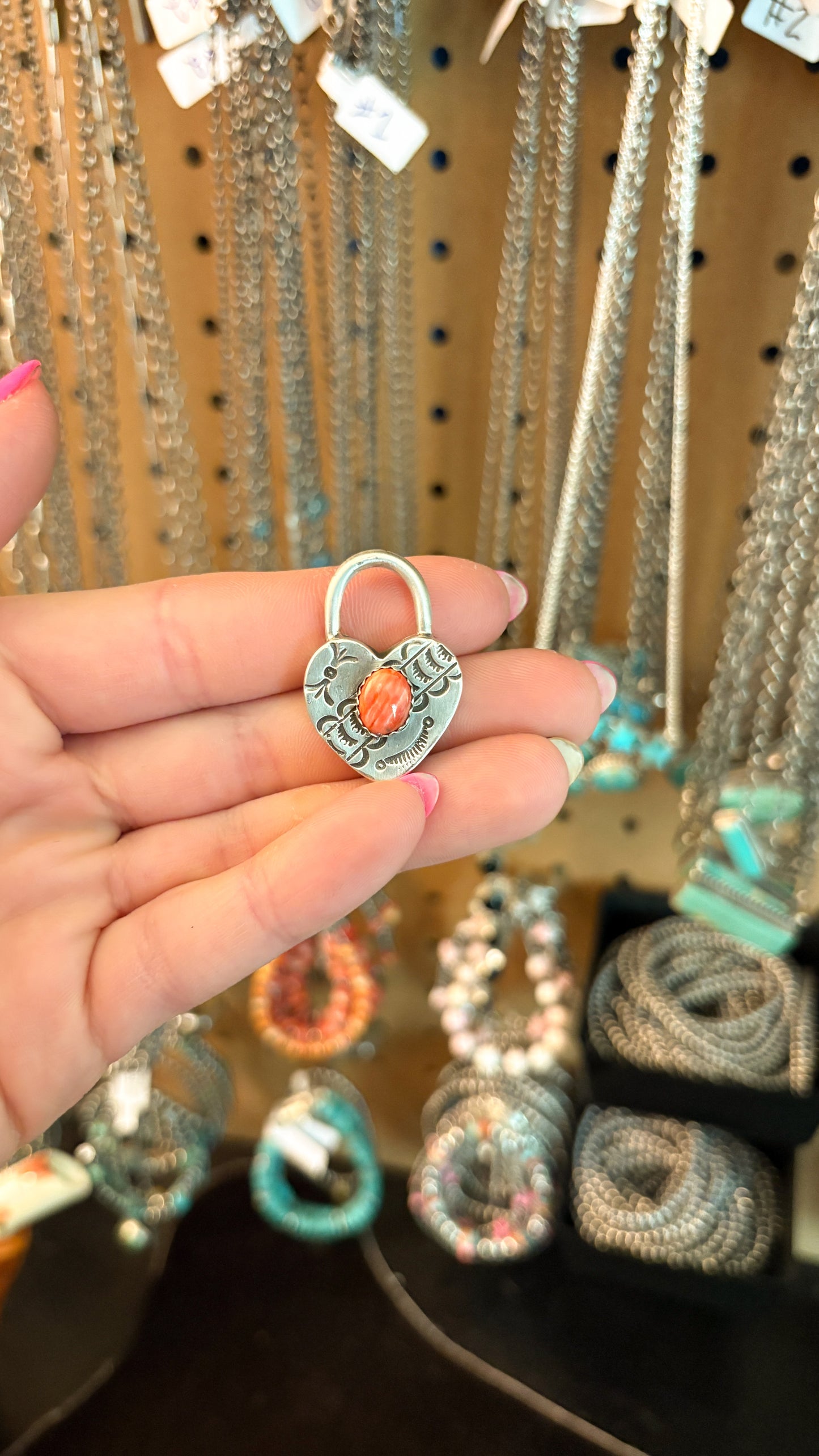 RED SPINY OYSTER HEART LOCKET BY HAROLD TAHE