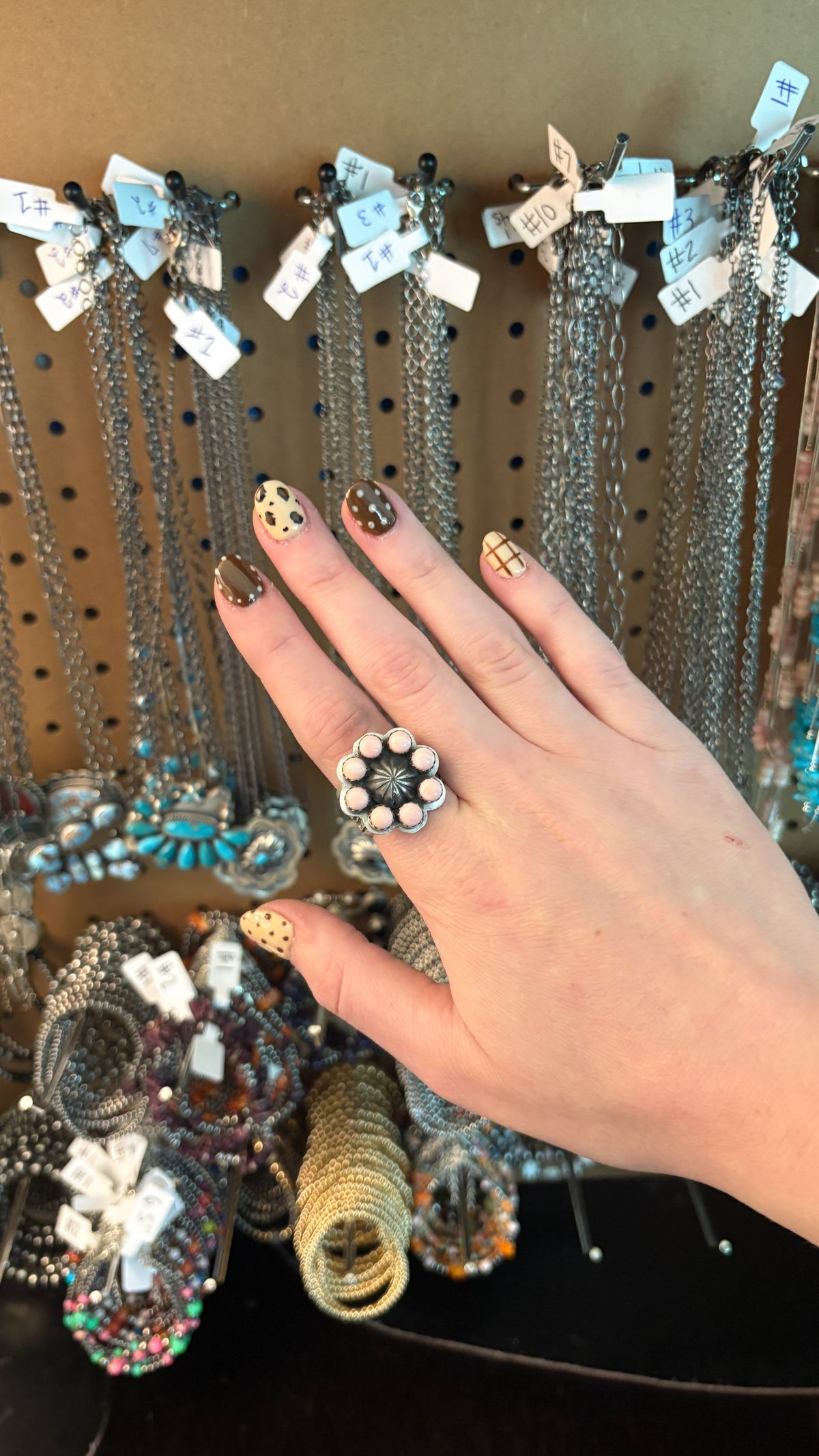 PINK CONCH STARSHOT CLUSTER RING W STAMPED CIGAR BAND