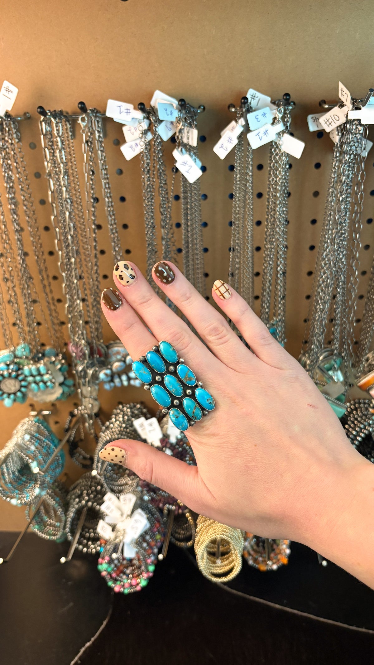 9 STONE RECTANGULAR TURQUOISE RING BY DEBRA SMITH