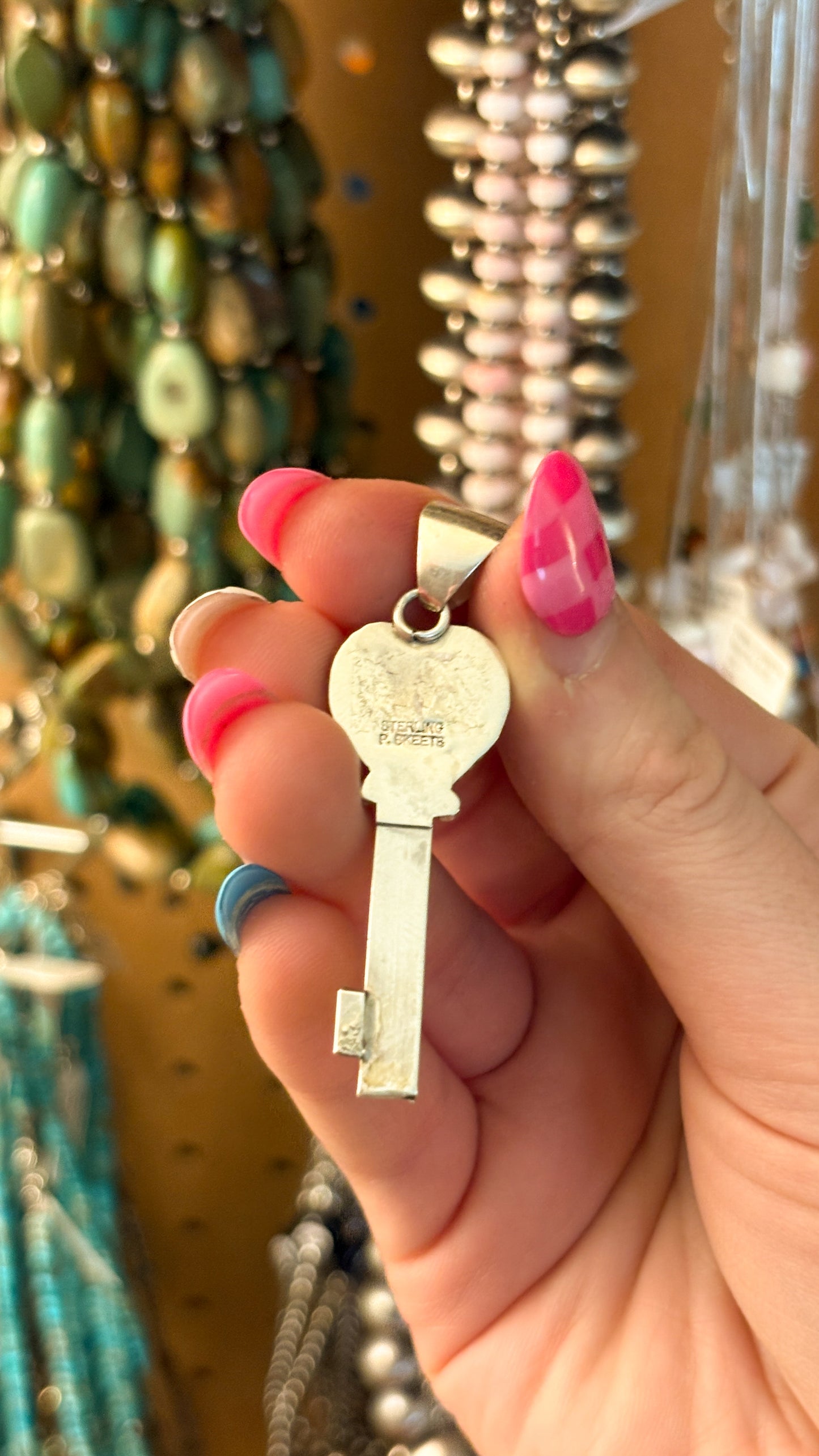 RED SPINY OYSTER HEART KEY PENDANT BY PEGGY SKEETS