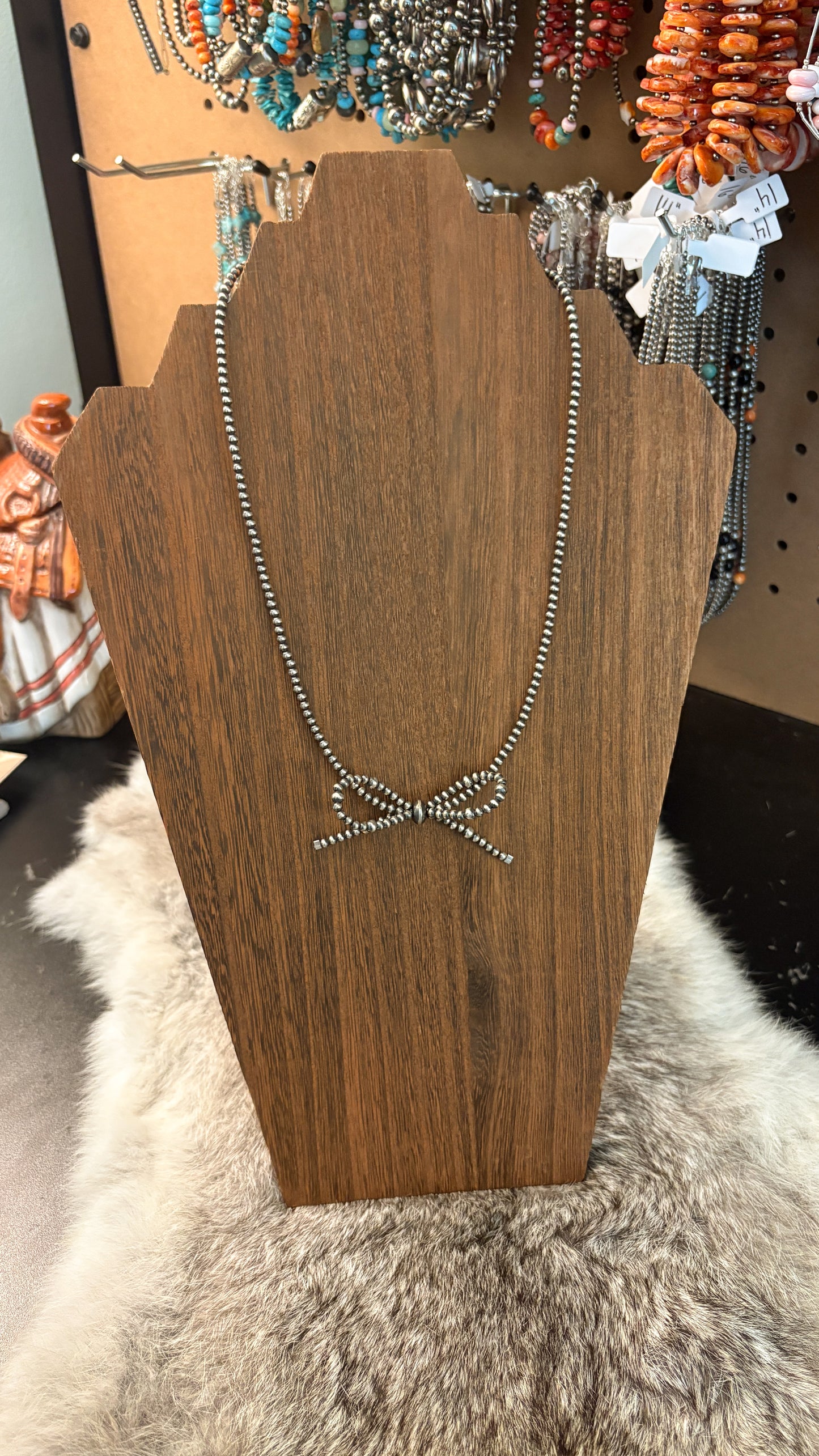 STERLING SILVER PEARL BOW NECKLACE
